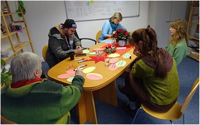 Researching educational barriers in participatory real-world labs: vocational training of refugees in rural counties in Germany